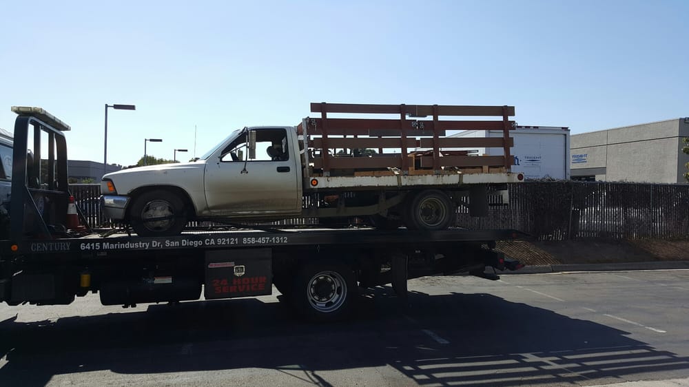 tow truck towing a truck