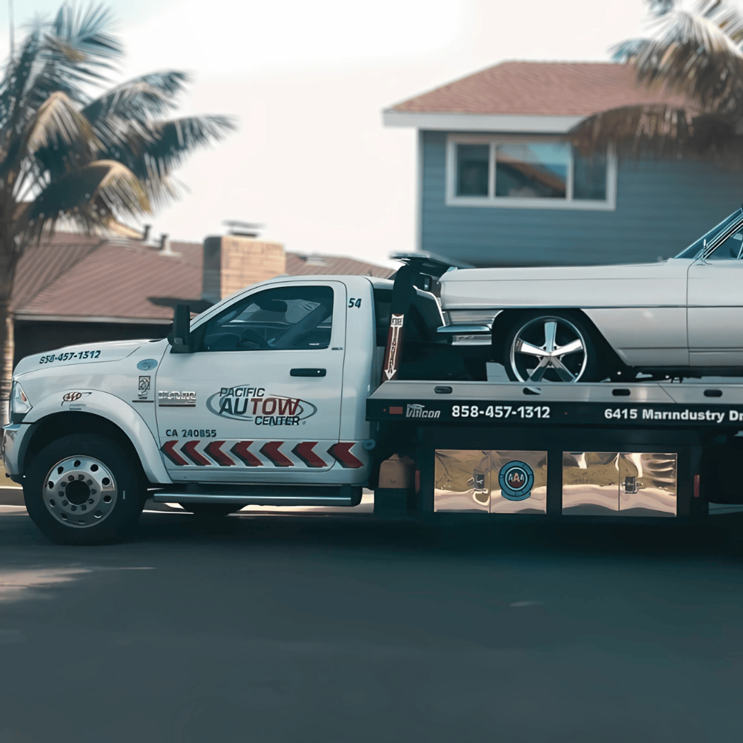 white flatbed tow truck