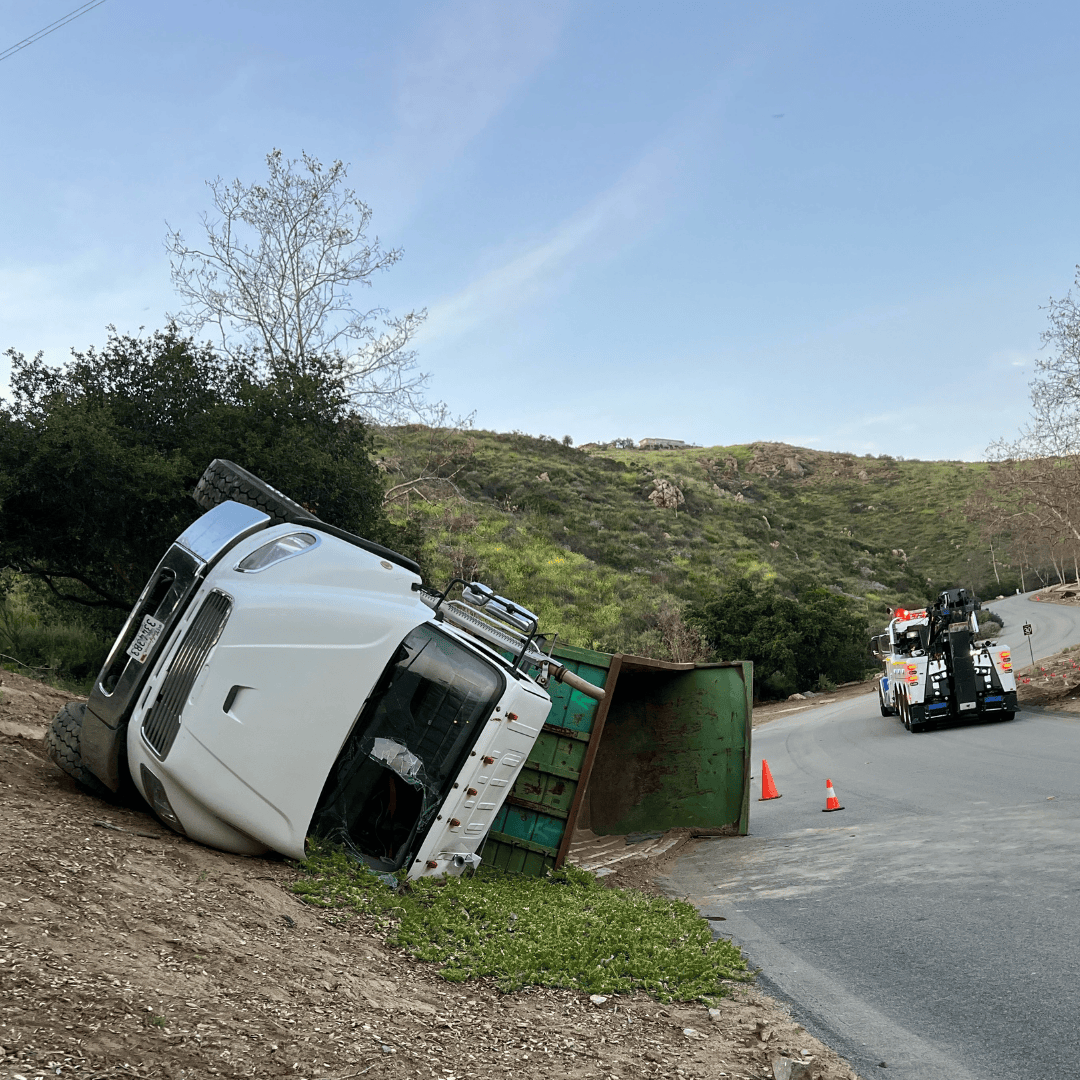 rotated heavy duty truck on the roadside